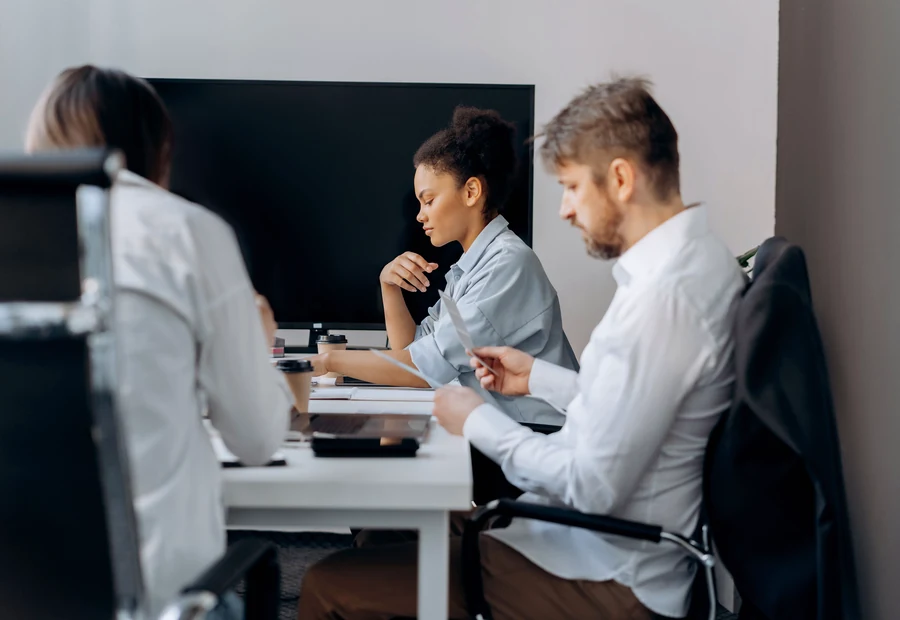 Consultant reviewing meeting inquiry with clients